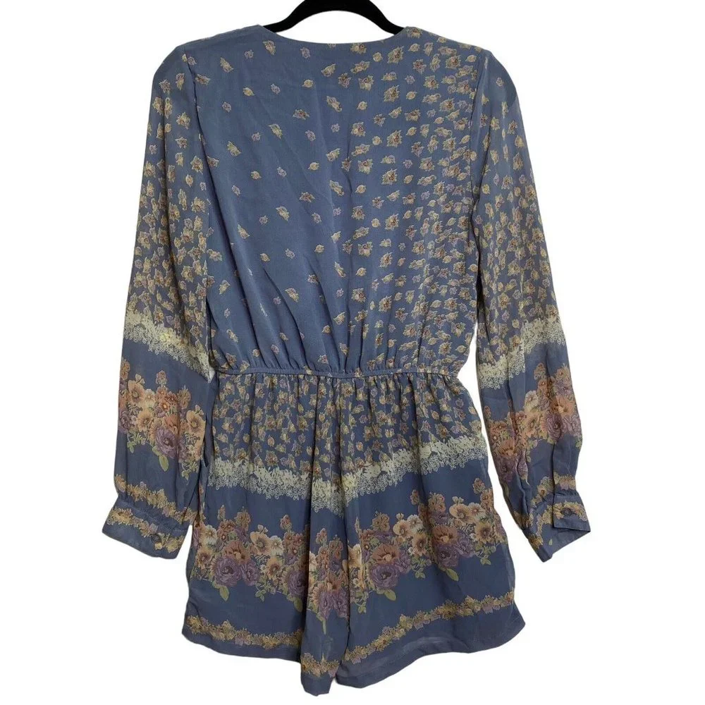 The Hanger Floral Romper Size Medium Baby Blue Long Sleeve Pockets Floral Shorts